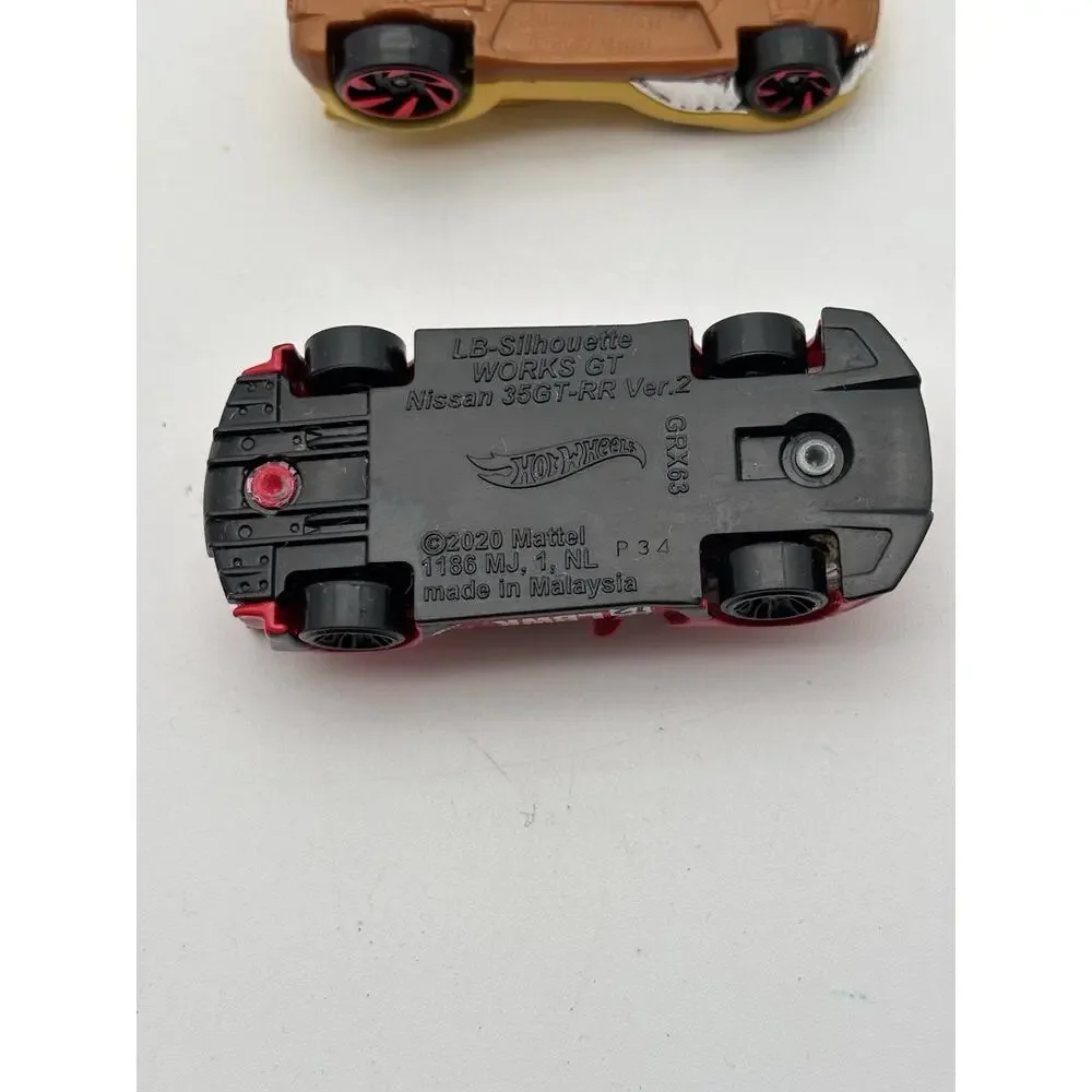 Vintage Hot Wheels Lot Of 5 Cars. FJ, Camaro, VW, Nissan GT And Howlin Heat.